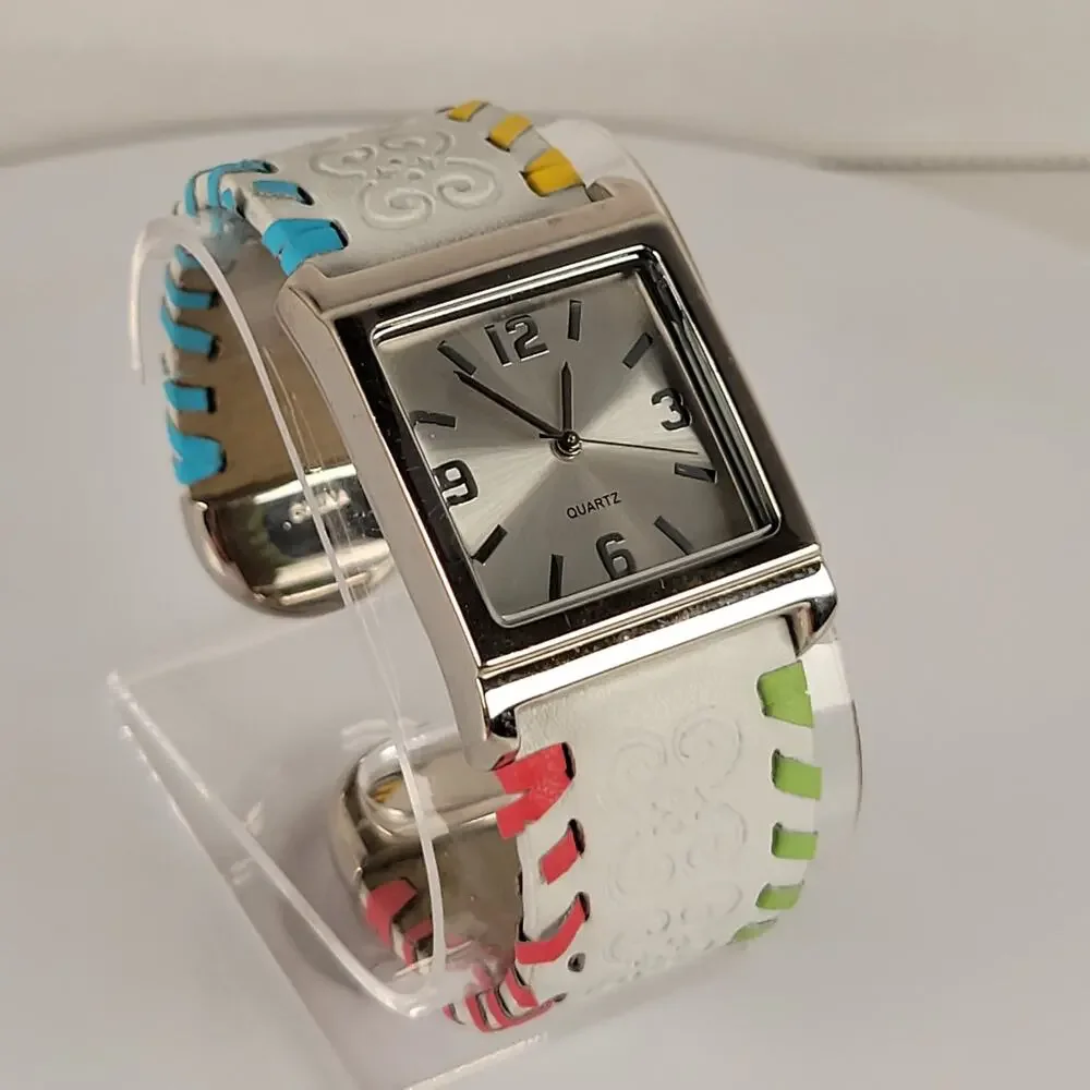 Silver Quartz Watch with Embossed Cuff White Leather Strap and Multicolor Design